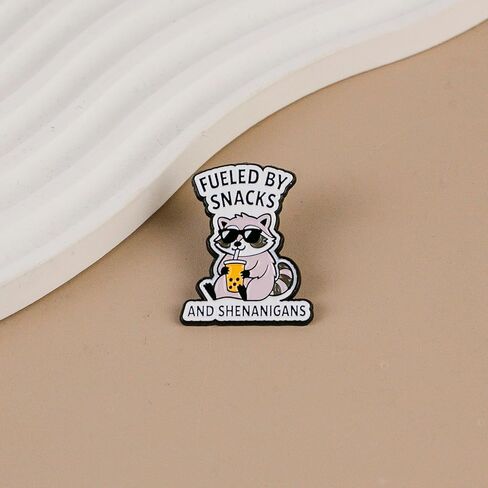 Fueled By Snacks And Shenanigans Chaotic Raccoon Snack Humor Enamel Pin, Cute Raccoon Chaos Pin Brooch, Snacky Trash Panda Brooch Badge, Snack Foodie Lapel Badges, Funny Quirky Gift For Sassy Girl Women Sarcastic Friend Snack Lover, Chaotic Animal Accesso in Saudi Arabia