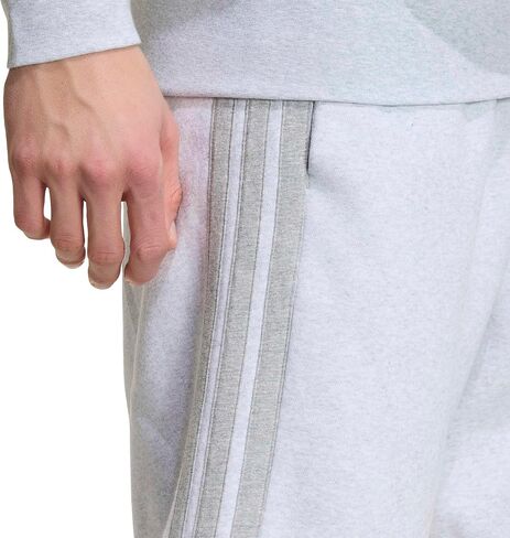 شورت رجالي من adidas Essentials 3-Stripes Fleece مقاس 9 بوصة، LightGreyHeatherMediumGreyHeather، Medium in Kuwait
