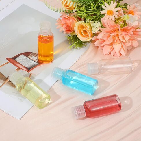 100 Pcs 1 OZ Travel Bottles with Flip Cap - 30 ml Clear Plastic Travel Size Containers, Portable Leak Proof Squeeze Bottles Refillable Empty Cosmetic Containers for Liquid Shampoo Lotion, Clear in Saudi Arabia