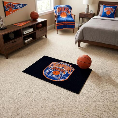 سجادة FANMATS New York Knicks NBA Finals Champions Starter - تصميم أبطال نهائيات NBA الرسمي| 19 بوصة × 30 بوصة | لون الفريق in Kuwait