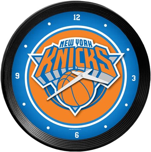 The Fan-Brand NBA New York Knicks: ساعة حائط بإطار مضلع - ديكور رياضي للمنزل وغرفة الألعاب وكهف المعجبين والمرآب - صناعة أمريكية in Kuwait