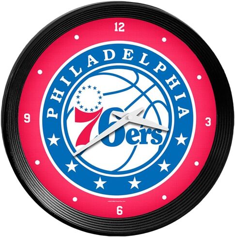The Fan-Brand NBA New York Knicks: ساعة حائط بإطار مضلع - ديكور رياضي للمنزل وغرفة الألعاب وكهف المعجبين والمرآب - صناعة أمريكية in Kuwait