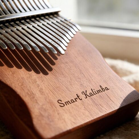 Smart Kalimba 17-Key Thumb Piano with App-Guided Learning Solid Wood Body Built-In Phone Holder in Kuwait
