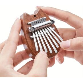 Mini 8-Key Kalimba Thumb Piano - Cute Instrument Pendant Keychain - Ideal Gift for Beginners - CAT in Kuwait