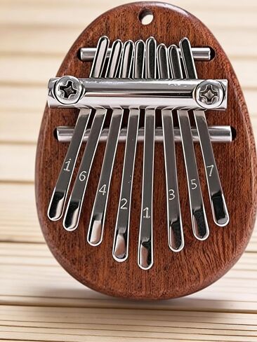 8 مفاتيح Sapele Water Drop Thumb Piano، بيانو صغير مع حبل، بيانو صغير محمول، هدايا مثالية لمحبي الموسيقى والمبتدئين in Kuwait