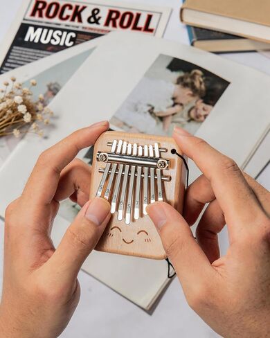 Mini Kalimba Thumb Piano - 9 Keys Portable Finger Piano with Lanyard Hole, Musical Instrument for Adults & Beginners, Travel Friendly in Kuwait