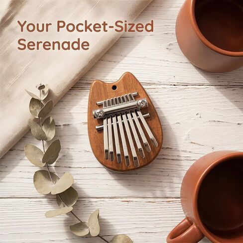 Mini 8 Key Thumb Piano Portable Finger Music Instrument Small Musical Pendant Ornament Gift Accessory in Kuwait