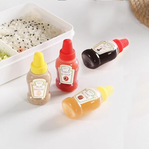 4 - Piece Set of Mini Food - Grade Squeeze Bottles for Sauces & Seasonings - Portable Plastic Dispensers in Kuwait