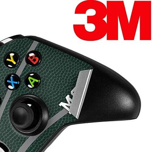 ملصق Skinit المخصص للألعاب متوافق مع وحدة تحكم Xbox One X - تصميم كرة السلة الأخضر لجامعة ولاية ميشيغان المرخص رسميًا in Kuwait