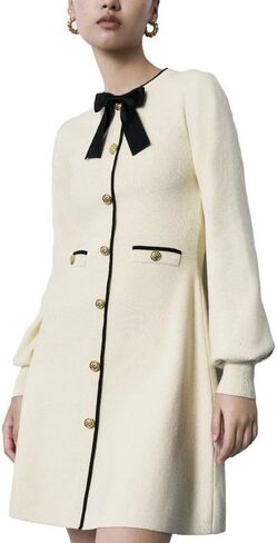 فساتين كنزة صوفية نسائية 2024 بأزرار صغيرة وأكمام طويلة منتفخة وخصر إمبراطوري in Kuwait