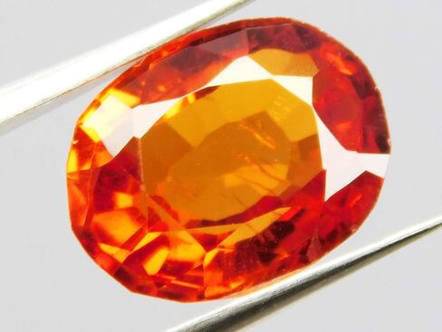 CERTIFIED Fire Orange Sapphire 12.11 Carat Natural Oval Cut Sparkling Gems A+ in Kuwait