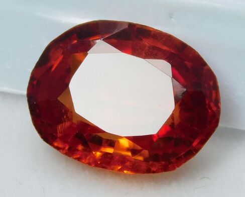 CERTIFIED Fire Orange Sapphire 12.11 Carat Natural Oval Cut Sparkling Gems A+ in Kuwait