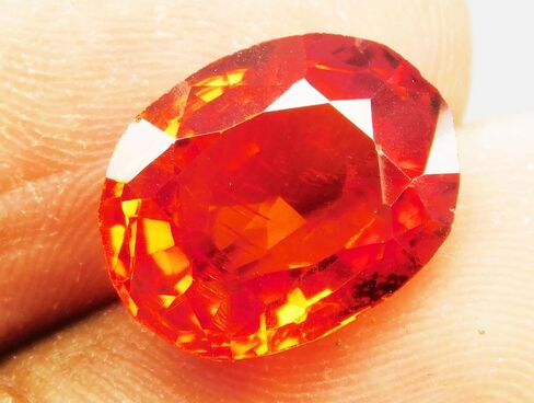 CERTIFIED Fire Orange Sapphire 12.11 Carat Natural Oval Cut Sparkling Gems A+ in Kuwait