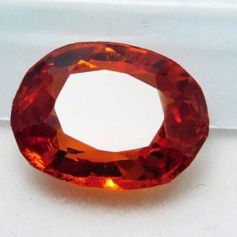 CERTIFIED Fire Orange Sapphire 12.11 Carat Natural Oval Cut Sparkling Gems A+ in Kuwait