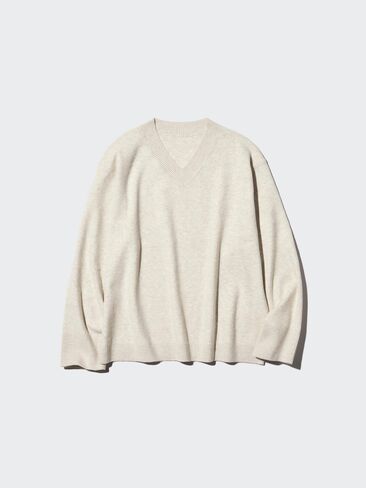 سترة Uniqlo متماسكة قابلة للغسل برقبة على شكل حرف V | سلس in Kuwait