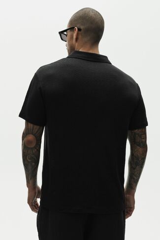 Alo Yoga Linen Jersey Coastal Short Sleeve Polo - Black in Saudi Arabia