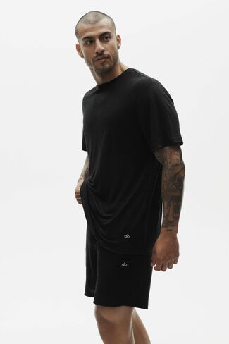 تي شيرت Alo Yoga Linen Jersey Coastal بأكمام قصيرة - أسود in Kuwait