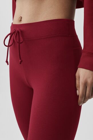 بنطلون رياضي Alo Yoga Sway Bootcut - أحمر صيفي رومانسي in Kuwait