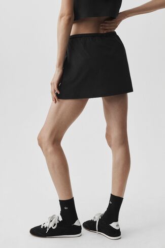 Alo Yoga Connection Mini Skirt - Black in Saudi Arabia