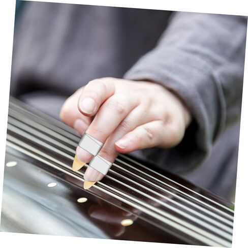 BESPORTBLE Guzheng استخدم جهاز تدريب الأظافر Guzheng لحماية الأصابع للمبتدئين، لون عشوائي in Kuwait