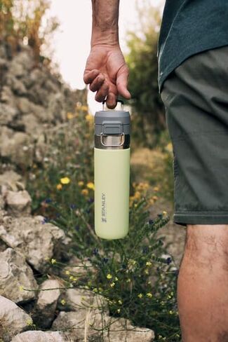 STANLEY Quick Flip GO Water Bottle 24 oz | Push Button Lid | Leakproof and Packable for Travel and Sports | Insulated Stainless Steel | BPA-Free | Blue Sky in Kuwait