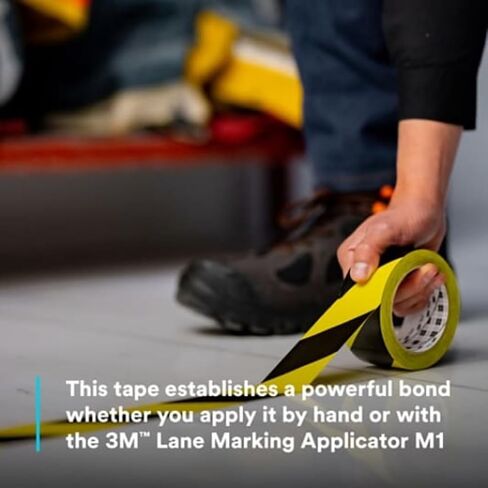 3M Hazard Warning Tape 766, 2 Inch x 36 Yards, Black and Yellow Striped Vinyl Safety Tape, High-Visibility Adhesive Floor Marking Roll for Warehouse, Aisle, Stair, Equipment, and Hazard Zones in Saudi Arabia