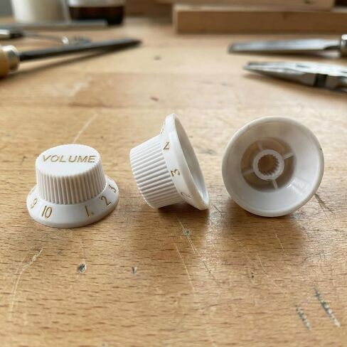 3 Pcs Electric Guitar Control Knobs Replacement Set (1 Volume & 2 Tone), White Top Hat Bell Knobs with Gold Numbers, Compatible with Squier Strat ST Electric Guitars in Kuwait