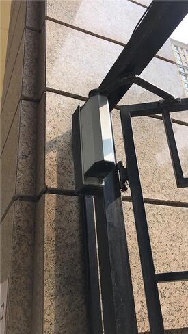 Popular Small Electric Swing Door Closer No Need Hand Side Mount Garage Opener for Home Courtyard Or Community in Kuwait