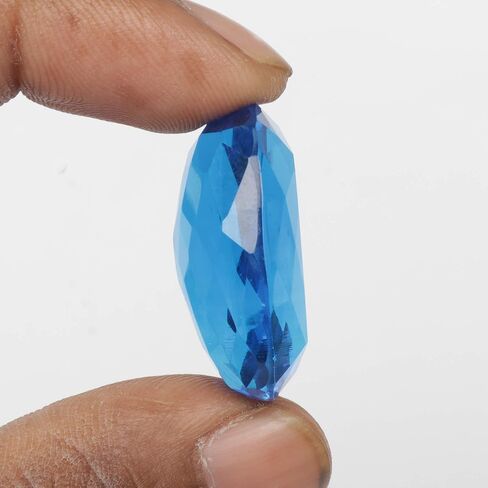 REAL-GEMS 56.75 قيراط على شكل وسادة توباز زرقاء تستخدم في صناعة المجوهرات in Kuwait