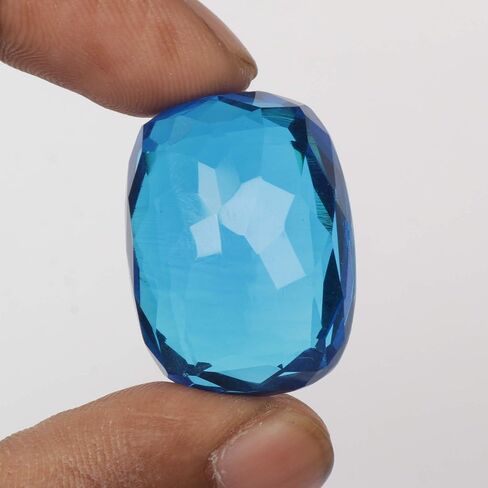 REAL-GEMS 56.75 قيراط على شكل وسادة توباز زرقاء تستخدم في صناعة المجوهرات in Kuwait
