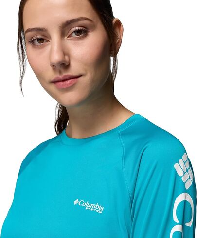 قميص PFG Tidal Tee II للسيدات من كولومبيا للحماية من الشمس بأكمام طويلة، شعار Ocean Teal/White، مقاس كبير in Kuwait