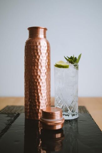 Copper Water Bottle 1 Liter (34 oz), 100% Pure Copper, Ayurvedic Drinking Bottle, Hammered Design, Leak Proof Cap, BPA Free, Health & Wellness Bottle in Kuwait