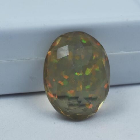 CERTIFIED Natural Oval Cut 9.95 Ct Ethiopian Opal Multi-Color Doublet Gemstone in Kuwait