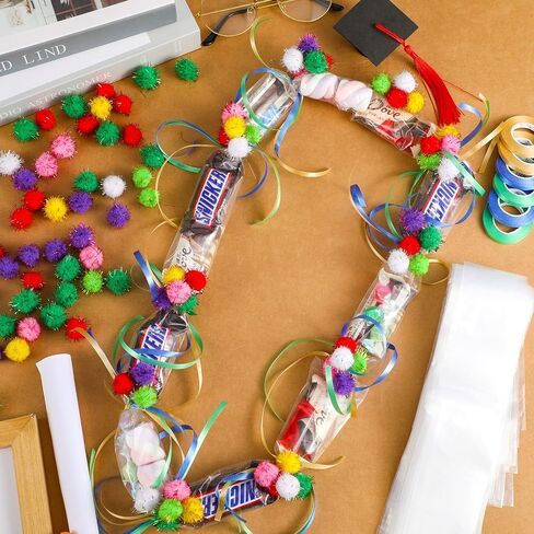 Hanaive Graduation Candy Lei Tubing Necklace Making Kit Include 50 Pcs 2 Inch Poly Tubing Lei Bags 197 ft 6 Rolls Gift Wrapping Ribbon 1 Pack Plush Poms 400 Glue Points for Graduation Party Supplies in Saudi Arabia