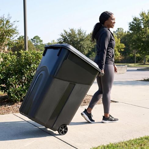 45 Gallon Wheeled Heavy Duty Plastic Garbage Can with Attached Lid, Durable Outdoor Trash Can with Wheels, Large Rolling Waste Bin for Yard, Garage, Patio, Home & Commercial Use, Black in Kuwait