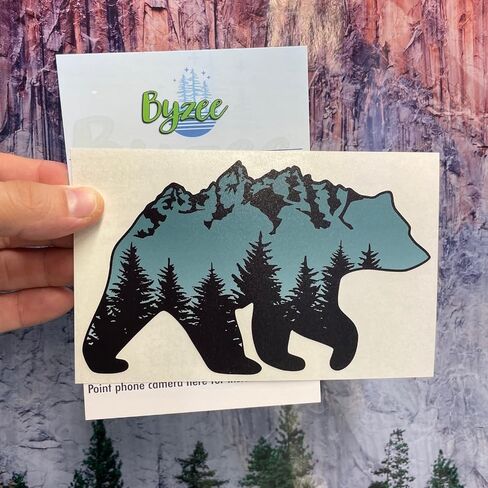 ملصق الدب البني Grand Tetons، ملصق من الفينيل الفاخر مونتانا GrandTeton Mountain Range، رسم غابة أشجار الصنوبر باللونين الأخضر والأسود لنافذة السيارة أو الشاحنة، والباب، والكمبيوتر المحمول (6x3.7) in Kuwait
