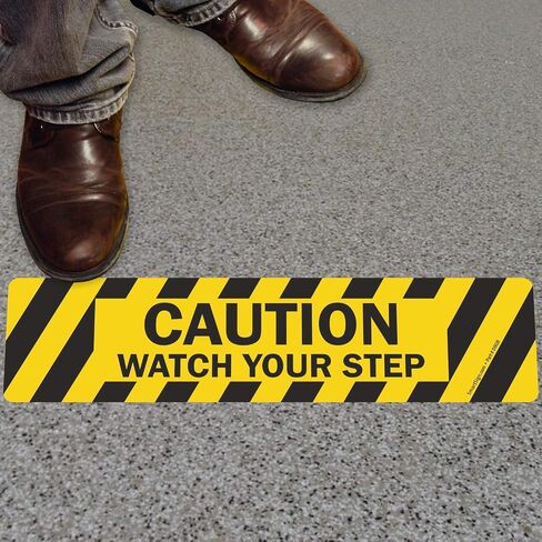 SmartSign-SF-0272-FO "Caution - Watch Your Step" Anti Slip Adhesive Floor Sign | 6" x 24" - Black on Yellow in Kuwait