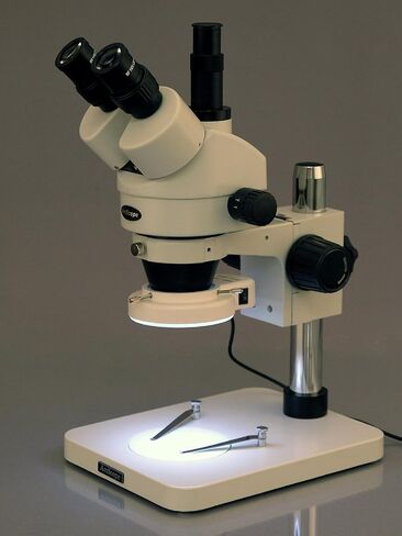 AmScope SM-1TSY-144S Professional Trinocular Stereo Zoom Microscope, WH10x Eyepieces, 7X-90X Magnification, 0.7X-4.5X Zoom Objective, 144-Bulb LED Ring Light, Pillar Stand, 110V-240V, Includes 2.0X Barlow Lens in Kuwait