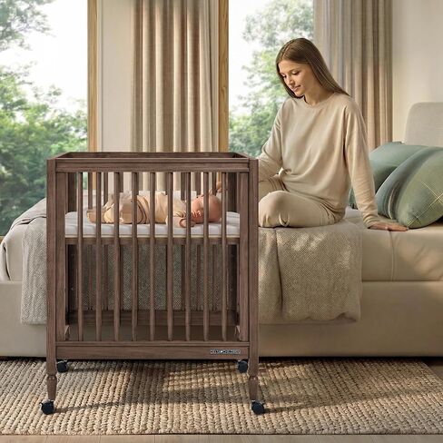 Delta Children Jalen Grow with Me 9-in-1 Convertible Crib, Teak Brown | Greenguard Gold Certified Crib Converts from Portable Bassinet to Crib, Toddler Bed, Daybed, Love Seat, Twin Bed & Full Bed in Kuwait