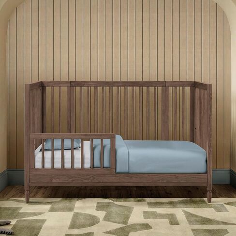 Delta Children Jalen Grow with Me 9-in-1 Convertible Crib, Teak Brown | Greenguard Gold Certified Crib Converts from Portable Bassinet to Crib, Toddler Bed, Daybed, Love Seat, Twin Bed & Full Bed in Kuwait
