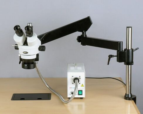 AmScope SM-8TZZ-FOR-5M Digital Professional Trinocular Stereo Zoom Microscope, WH10x and WH20x Eyepieces, 3.5X-180X Magnification, 0.7X-4.5X Zoom Objective, Fiber-Optic Ring Light, Articulating-Arm Boom Stand, 110V-240V, Includes 0.5x and 2.0x Barlow Lens in Kuwait