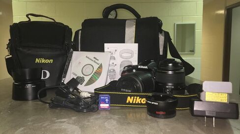 Nikon D3200 24.2 MP CMOS Digital SLR Camera with 18-55mm and 55-200mm VR DX Zoom Lenses Bundle in Kuwait