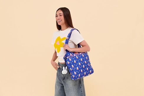 JuJuBe Miffy Flower Fields Diaper Clutch Wristlet, Compact Diaper & Wipes Organizer Pouch with Adjustable Crossbody Strap, Stroller Hanging Zip Case, Machine Washable Small Diaper Bag Accessory in Kuwait
