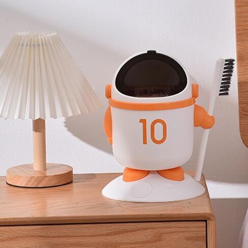 Mini Astronaut Trash Bin with Lid and Brush, Small Desktop Garbage Can for Bedroom and Dormitory, Orange Cartoon Wastebasket for Home and Room in Kuwait
