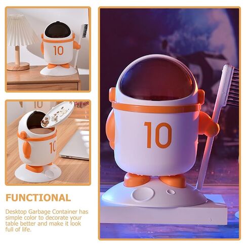 Mini Astronaut Trash Bin with Lid and Brush, Small Desktop Garbage Can for Bedroom and Dormitory, Orange Cartoon Wastebasket for Home and Room in Kuwait
