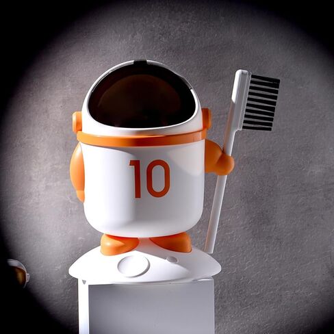 Mini Astronaut Trash Bin with Lid and Brush, Small Desktop Garbage Can for Bedroom and Dormitory, Orange Cartoon Wastebasket for Home and Room in Kuwait