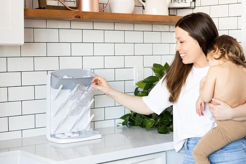 Ubbi Vertical Baby Bottle Drying Rack, Space Saving Countertop Bottle Dryer | 13-Peg Bottle Drying Rack Removable Drain Tray, Baby Organizer for Pump Parts, Pacifiers & Accessories, Dishwasher Safe, Gray in Kuwait