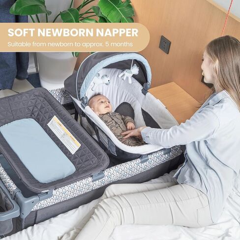 5 in 1 Multifunctional Pack and Play,Qutanix Foldable Baby Crib with Bassinets,Changing Table,Newborn Napper with Canopy,Diaper Stacker,Baby Playpen for Babies and Toddlers in Kuwait