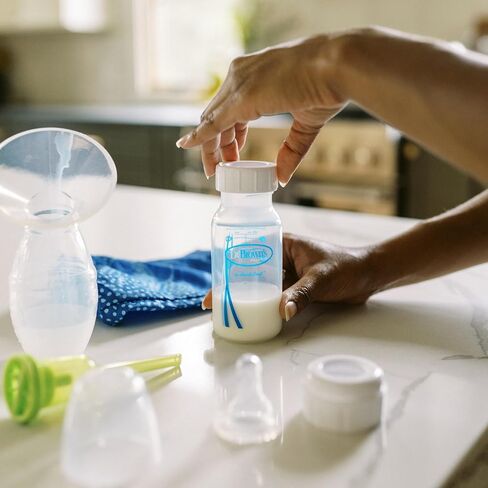 Dr. Brown's 100% Silicone One-Piece Breast Pump, Hands-Free Breast Milk Collector with Anti-Colic Options+ Baby Bottle, 4 oz with Slow Flow Nipple, Travel Lid and Travel Bag in Kuwait