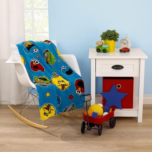 Sesame Street Come and Play Blue, Green, Red and Yellow, Elmo, Big Bird, Cookie Monster, and Oscar The Grouch Toddler Blanket in Kuwait